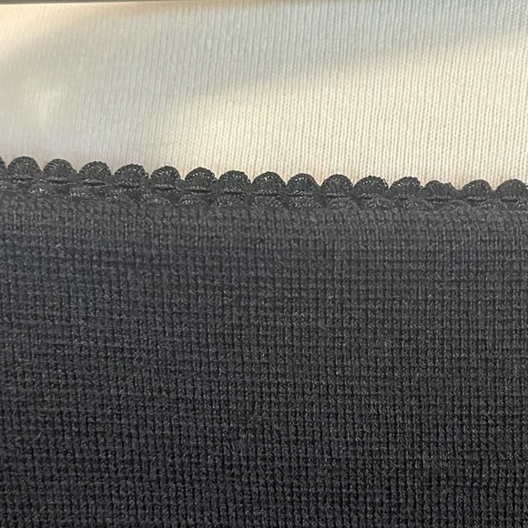 Marc Cain knit black knee length skirt with metallic silver side seams. - Picture 3 of 14